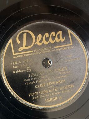 Jiminy Cricket) from the 1940 Walt Disney film Pinocchio. Cliff Edwards